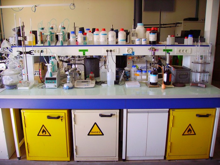 On a lab bench there are four balloons